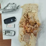 Ақтөбеде тергеу изоляторына телефонды донерге жасырып өткізбек болған